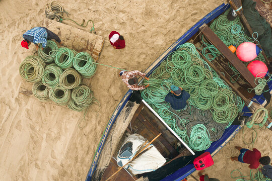 Aerial view of a boat and tractor used for Arte Xávega  in Torreira, Portugal