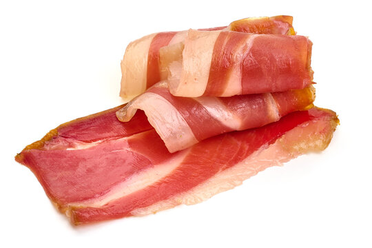 Dry Spanish ham, Jamon Serrano, Bellota, Italian Prosciutto Crudo or Parma ham, isolated on white background. High resolution image.