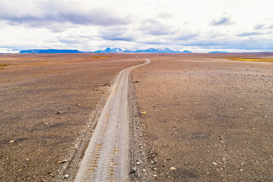 Aerial view of Kjolur 4WD road through desolate landscape in highlands, Iceland