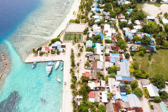 Aerial view of the local island Omadhoo, Alif Dhaal Atoll, Maldives.