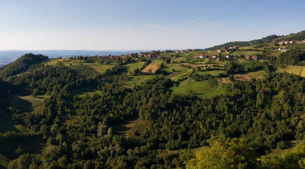 Naklejka premium Panoramic hilly landscape of Lower Srebrenik settlement with forests and meadows
