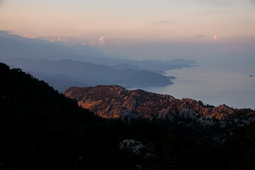 Fototapeta premium beautiful view of the mountain ranges near the coast of the sea