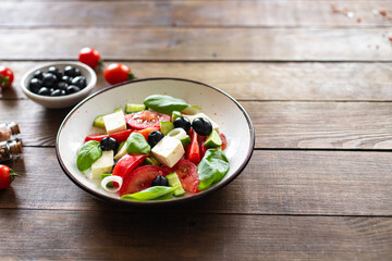 Greek salad feta, olives, vegetables, tomato no meat food organic product meal snack on the table copy space food background rustic. top view keto or paleo diet veggie vegan or vegetarian food
