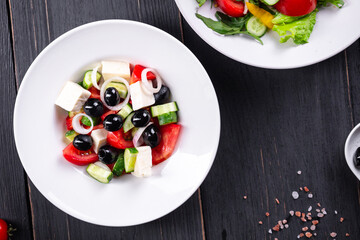 Greek salad feta, olives, vegetables, tomato no meat food organic product meal snack on the table copy space food background rustic. top view keto or paleo diet veggie vegan or vegetarian food