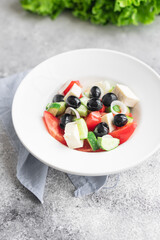 Greek salad feta, olives, vegetables, tomato no meat food organic product meal snack on the table copy space food background rustic. top view keto or paleo diet veggie vegan or vegetarian food