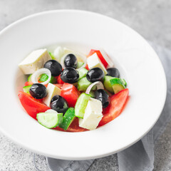 Greek salad feta, olives, vegetables, tomato no meat food organic product meal snack on the table copy space food background rustic. top view keto or paleo diet veggie vegan or vegetarian food