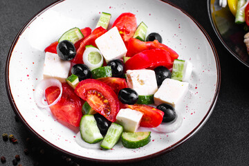 Greek salad feta, olives, vegetables, tomato no meat food organic product meal snack on the table copy space food background rustic. top view keto or paleo diet veggie vegan or vegetarian food