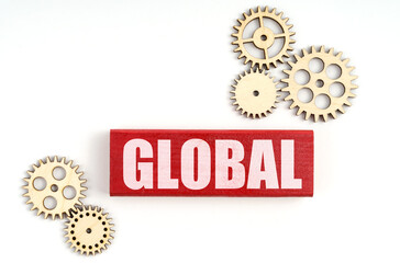On a white background, gears and jenga with the inscription - GLOBAL