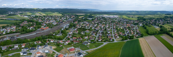 Fototapeta na wymiar Aerial view around the city Neuenmarkt, Hegnabrunn in Germany, on a sunny day in spring.