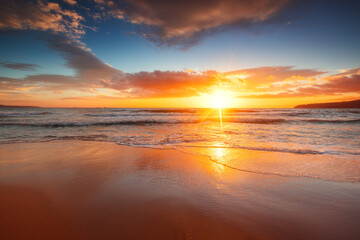 Naklejka na ściany i meble Beach sunrise over the tropical sea