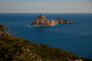 Magnificent view of a rocky island in the middle of the Mediterranean Sea