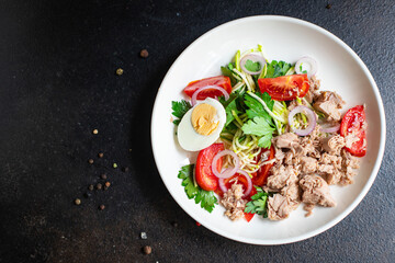 tuna salad vegetable seafood tomato, olives canned tuna fish plate on the table, healthy meal copy space food background top view keto or paleo diet veggie pescetarian diet