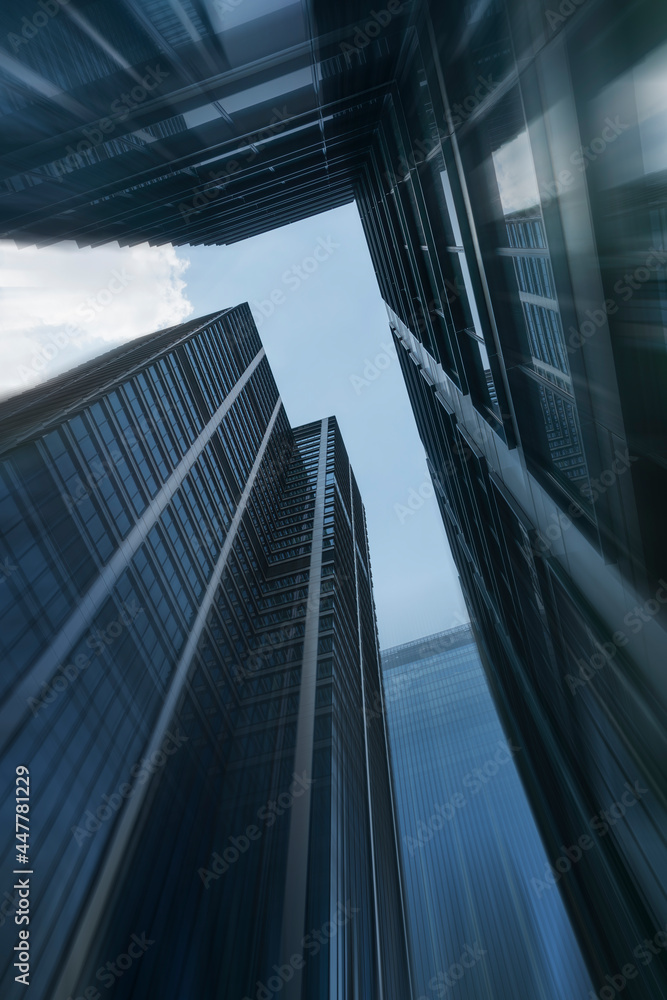 Wall mural down angle view of the city skyscrapers with speed blur. good for architectural, investment purposes