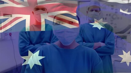Australia flag waving against portrait of team of surgeons wearing face masks at hospital - Powered by Adobe