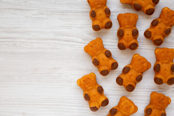 Homemade Sweet Bears Cookies on a white wooden background, top view. From above, flat lay, overhead. Copy space.