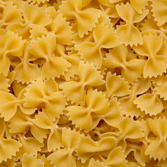 Dry Organic Farfalle Pasta, top view. Flat lay, overhead, from above.