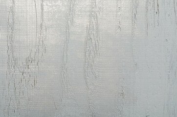 Painted grey scratched wood as background 