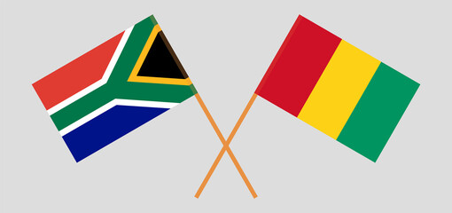 Crossed flags of Republic of South Africa and Guinea. Official colors. Correct proportion