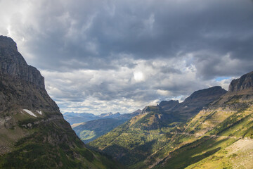 Fototapeta premium View into valley and mountains in Glacier National Park, Montana, USA