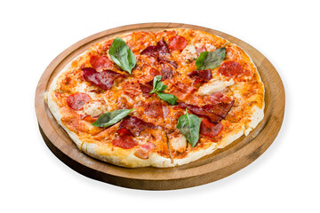 Italian meat pizza with chicken, ham, basil and cheese on the board isolated on white