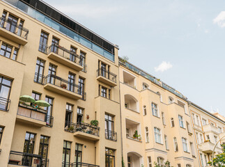 orange apartment house with glass rooftop