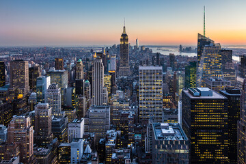 New York City skyline with urban skyscrapers at dusk, USA.