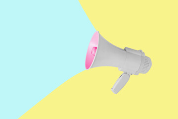Gray pink megaphone isolated on illuminating yellow background. Abstract, colorful, creative scene with pastel blue copy space. Note card and promotion idea. Minimal, aesthetic advertising concept.