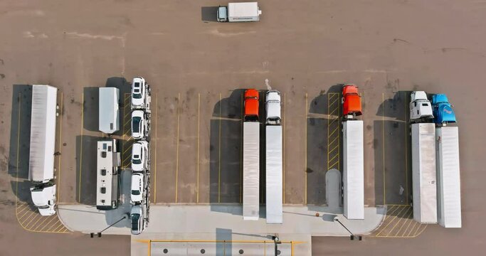04 JULY 2021 Amarillo Texas USA: Panoramic view with rest area of truck stop of trucks trailers parked a row near US Interstate road