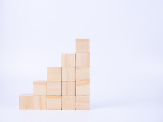 Wooden cubes are arranged like a ladder. Business concept.