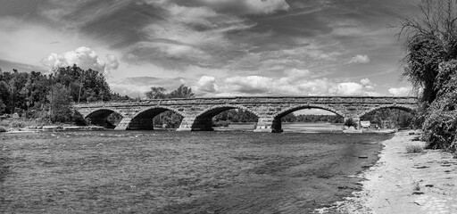 A 5 span stone bridge over a river