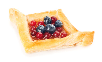 Danish pastry with fruit jam and berries on white background