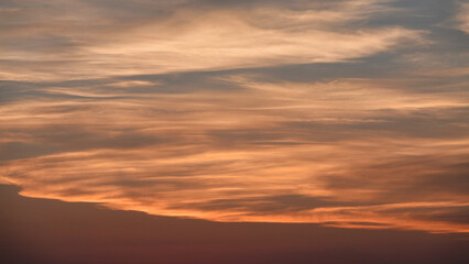 Fototapeta premium Sky and sunset in blue, white, red, pink tones over mountain . Color swatch of sunset colors mixed together