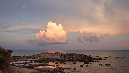 cloud collection and sunset over the beach