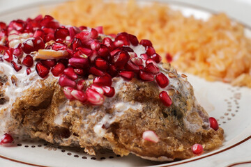 rich and traditional chiles en nogada typical of México