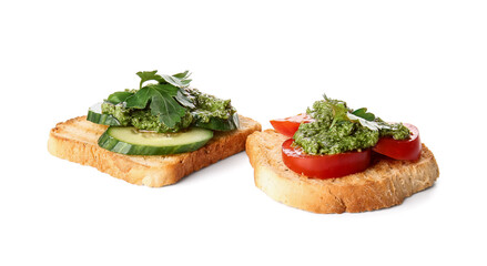 Tasty toasts with pesto sauce on white background