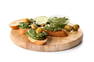 Tasty toasts with pesto sauce and olives on white background