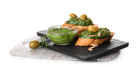 Tasty toasts with pesto sauce and olives on white background