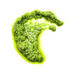Smear of tasty pesto sauce on white background
