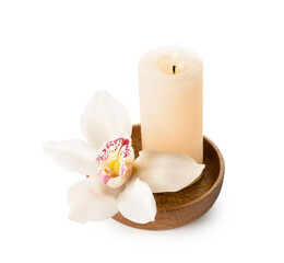 Fototapeta na wymiar Bamboo tray with burning candle and orchid flower on white background