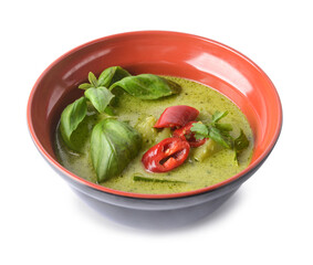Bowl of tasty green chicken curry on white background