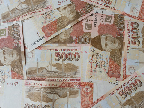 Pakistan currency notes background five thousand rupees note