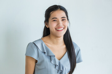 Delighted Asian woman smiling for camera