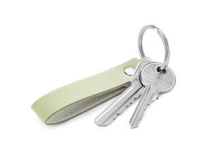 Keys with leather keychain on white background