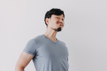 Fototapeta premium Insolent denying face of Asian man in blue t-shirt isolated on white background.