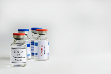 Vaccine bottle for immunization from coronavirus covid 19 epidemic on lab table with copy space, Concept with vaccine vial for Coronavirus, Sars, Covid 19 virus.