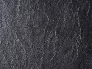 Rough graphite background. cheese cutting board