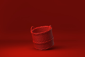 Red wicker basket floating in red background. minimal concept idea creative. monochrome. 3D render.