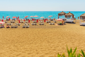 ANTALYA, TURKEY: Gazebos, sun loungers and umbrellas on the Lara beach on a sunny summer day in Antalya.