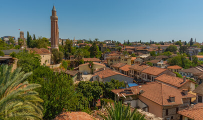Fototapeta na wymiar ANTALYA, TURKEY: Yivli Minare Mosque is a Landmark in Antalyas Old town Kaleici.