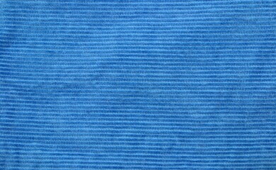 Texture. Blue corduroy fabric. Fabric material